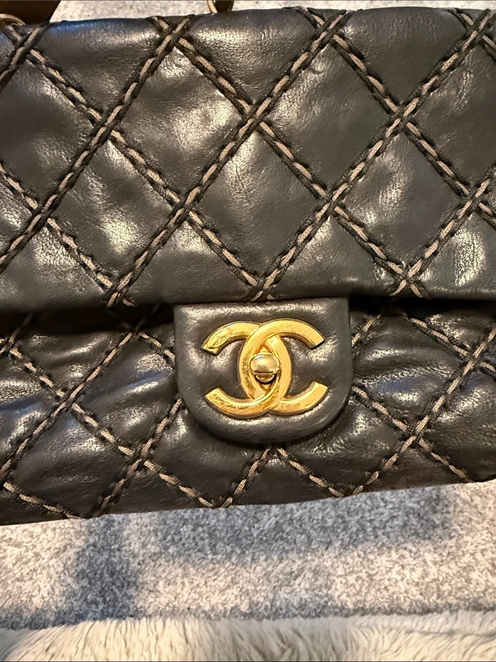 CHANEL Black Quilted Leather Shoulder Bag with Gold Hardware